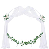 White sheer chiffon fabric panel draped over a wedding arch, 29 inches wide by 19 feet long, lightweight and flowing - view 2