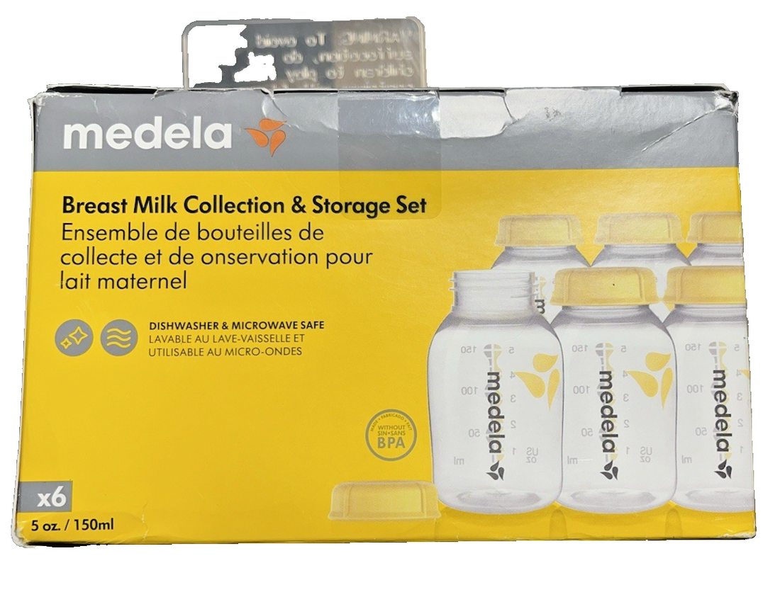 Six Medela 5oz clear breast milk storage bottles with yellow lids showing ounce and milliliter measurement markers