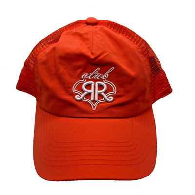 Roller Rabbit Club RR trucker hat in bright orange with embroidered RR logo, mesh back panels, and plastic snapback closure