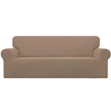 Easy-Going camel check jacquard stretch slipcover fitted over a 3-seater sofa with elastic bottom and smooth tailored coverage