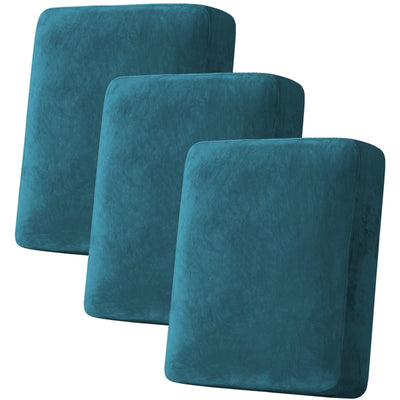 Three deep teal velvet stretch sofa cushion covers by H.VERSAILTEX stacked and displayed on a modern living room couch