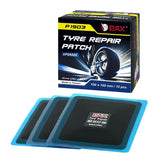 Eight black square PAX 100x100mm natural rubber tire repair patches laid flat, showing nylon ply surface and PET film backing