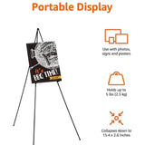 Amazon Basics black steel collapsible tripod easel display stand fully extended on floor holding a poster - view 6