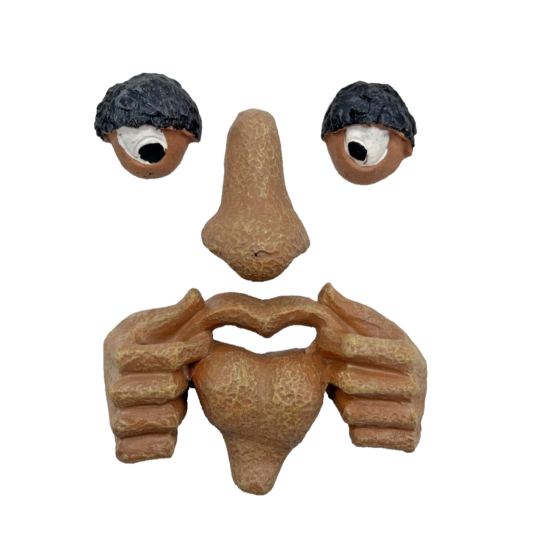 Brown resin tree face sculpture with textured bark finish and exaggerated expression, 6x3 inches, for outdoor garden trees