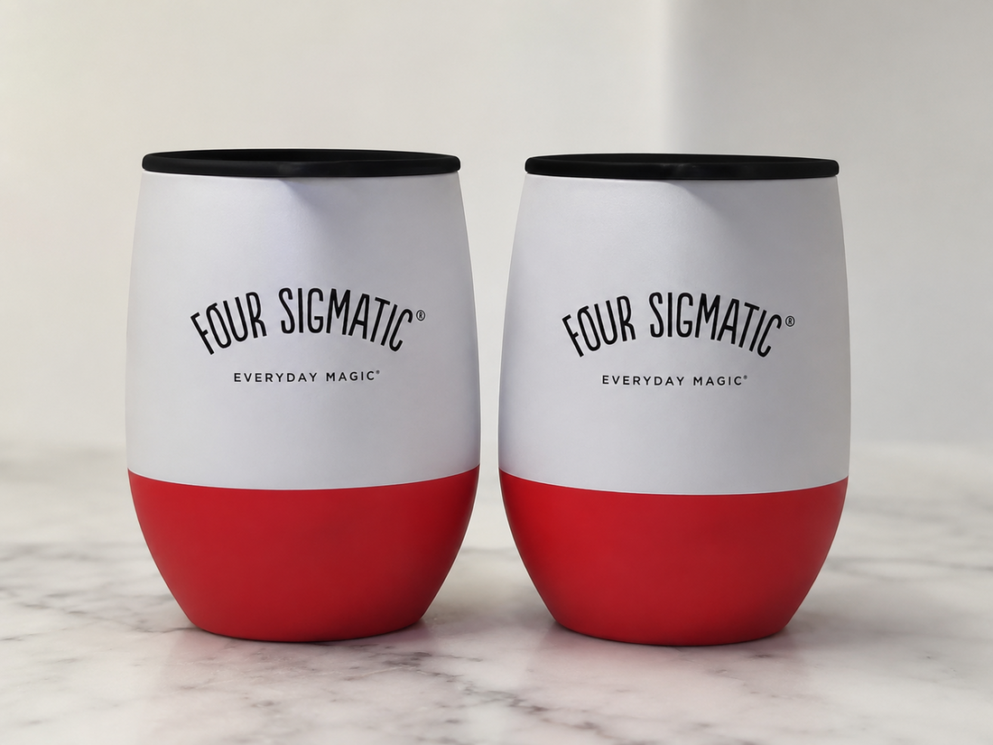 Two white Four Sigmatic 12oz stainless steel insulated travel mugs with spill-proof lids and silicone sleeves