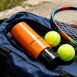 Orange Vwleya tennis ball pressurizer canister holding 3 tennis balls with screw-lock lid on white background - view 6