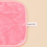 Shapermint dual-sided reusable makeup remover cloth laid flat showing textured exfoliating and smooth removal sides - view 4