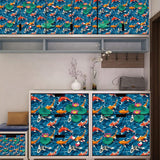 Six square fish in water self-adhesive vinyl wall decals in blue, each 15.74x15.74 inches, shown applied to a wall - view 3