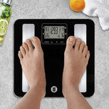 Weight Watchers WW702XF black tempered glass digital bathroom scale displaying body fat and BMI metrics - view 2