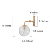 Gold metal wall sconce with handblown seeded globe glass shade 5.5 inch diameter mounted on wall, warm ambient light - view 3