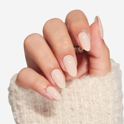 Modelones 32-piece short almond-shaped milky white and pink press-on nails displayed in 16 sizes with glue and accessories