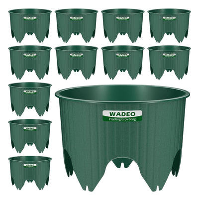 Twelve green 7-inch WADEO plastic planting grow rings arranged in a garden bed around vegetable plants for deep root watering