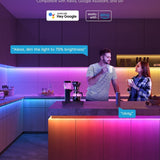 Govee H618C RGBIC 32.8ft LED strip lights displaying multiple colors simultaneously along a wall or room edge - view 3