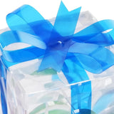 Three lit Christmas gift boxes in small, medium, and large sizes with red, green, and blue bows glowing with warm LED lights - view 8