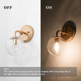 Gold metal wall sconce with handblown seeded globe glass shade 5.5 inch diameter mounted on wall, warm ambient light - view 7