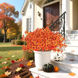 Seven 13-inch orange artificial fall flower stems with 20 flowerheads displayed in a decorative outdoor arrangement - view 4