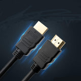 Black male-to-male HDMI cable coiled on white background compatible with TV laptop projector and PC - view 2
