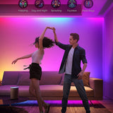 Govee H618C RGBIC 32.8ft LED strip lights displaying multiple colors simultaneously along a wall or room edge - view 4