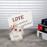 MALACHI clear acrylic cat-shaped memo and photo clip holder stand on a desk, 2x2x2 inches, multicolor print - view 2