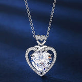 Rhodium-tone infinity heart cubic zirconia pendant necklace on adjustable rolo chain with blue suede gift box and pouch - view 6
