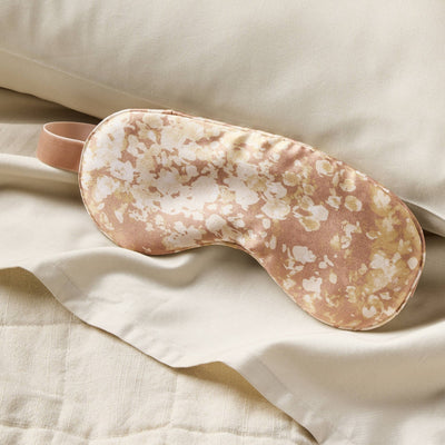 Casaluna blush pink floral print silk sleep eye mask with adjustable strap, 8.5 inches wide, shown flat