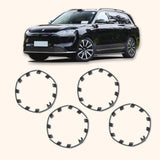 Set of four black ABS plastic rim protectors for 21-inch Tesla Model Y Überturbine wheels shown individually on white background - view 7