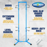 GOEHNER's green steel freestanding 4-bike storage rack with rubber-coated hooks standing upright in a garage - view 6