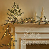 Fudios 6-foot lighted Christmas pine garland with 48 warm white LED lights draped over a fireplace mantel indoors - view 7