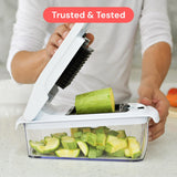Fullstar Pro white vegetable chopper spiralizer with 5-cup container and 4 interchangeable stainless steel blades on countertop - view 2