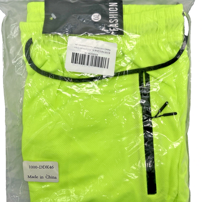 BUXKR black men's athletic gym shorts size 2XL with zippered side pockets and elastic waistband, laid flat on white background