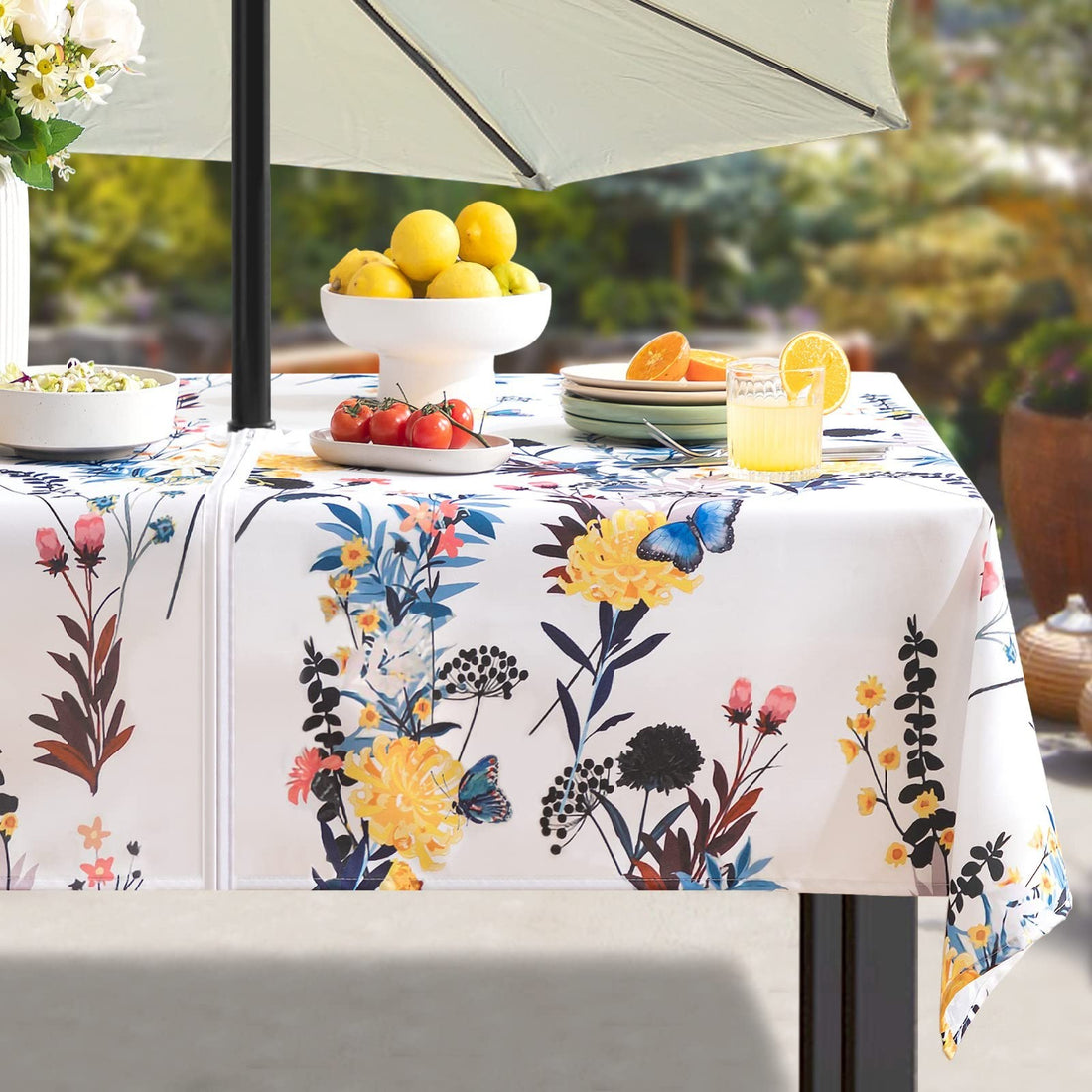 Rectangular floral waterproof tablecloth 60x104 inches with zippered umbrella hole on outdoor patio dining table