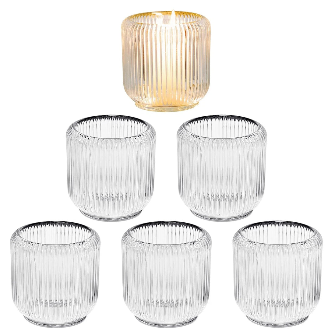 Set of 6 clear ribbed glass candle holders 3.5 inches holding tea light and votive candles on a decorated table