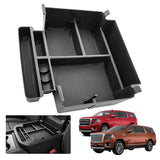 Black ABS plastic sliding center console organizer tray with multiple compartments and non-slip rubber pads for 2021-2026 Tahoe Suburban Yukon