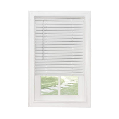 Classic Touch white vinyl cordless 1-inch mini blind 23x64 inches mounted on window with light filtering slats closed