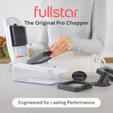 Fullstar Pro white vegetable chopper spiralizer with 5-cup container and 4 interchangeable stainless steel blades on countertop - view 3