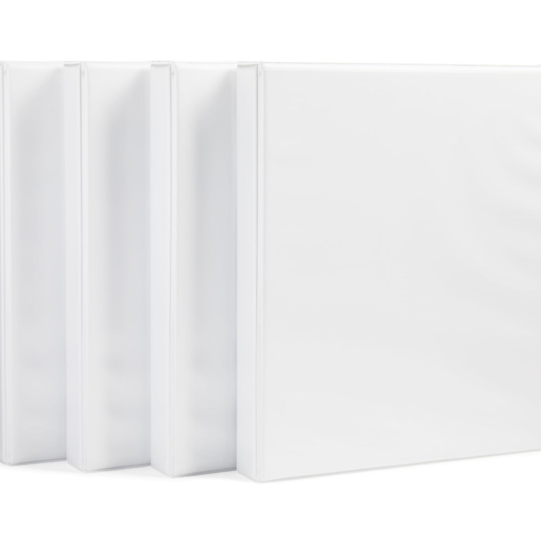 Four white AmazonBasics 1-inch 3-ring binders with clear overlay covers and interior pockets, shown in original packaging