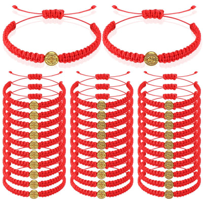 Set of 20 red and gold cord Saint Benedict medal bracelets with S-hook clasp displayed on a flat surface