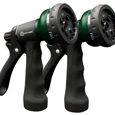 Two green AUTOMAN ABS garden hose nozzles with 7-pattern spray settings and ergonomic grip, open box condition