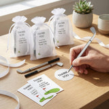 24 golf club shaped ballpoint pens, notepads, organza bags, and thank-you cards arranged as party favor sets - view 2