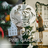 Fudios 6-foot lighted Christmas pine garland with 48 warm white LED lights draped over a fireplace mantel indoors - view 2