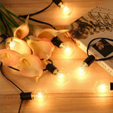 25-foot black cord outdoor G40 globe Edison bulb string lights hung on patio, warm white glow, waterproof - view 5