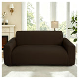 Coffee brown stretch sofa slipcover fitted over a 3-cushion couch, showing elastic bottom and gingham puff grid pattern