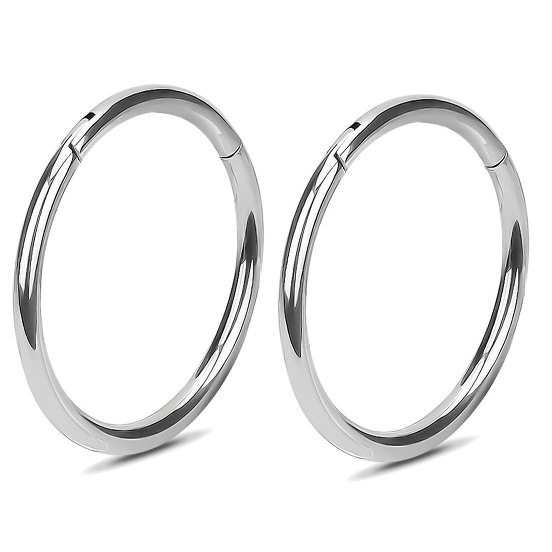 Two silver titanium hinged clicker nose ring hoops 16G 10mm for septum cartilage and helix piercings on white background