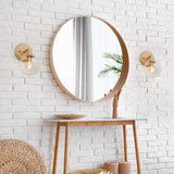 Gold metal wall sconce with handblown seeded globe glass shade 5.5 inch diameter mounted on wall, warm ambient light - view 5