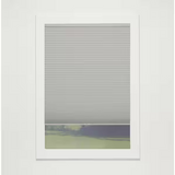 Gray Cloud cordless blackout single-cell cellular window shade 25.5 by 54 inches with white exterior backing mounted on window
