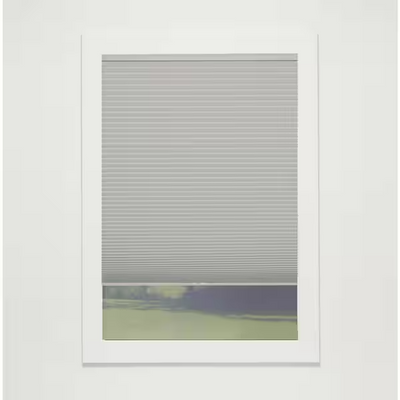 Gray Cloud cordless blackout single-cell cellular window shade 25.5 by 54 inches with white exterior backing mounted on window