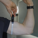 White retractable fabric body tape measure by MeasureWiz showing CM and inch markings on compact ergonomic casing - view 5