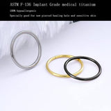 Two silver titanium hinged clicker nose ring hoops 16G 10mm for septum cartilage and helix piercings on white background - view 2
