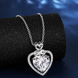 Rhodium-tone infinity heart cubic zirconia pendant necklace on adjustable rolo chain with blue suede gift box and pouch - view 4