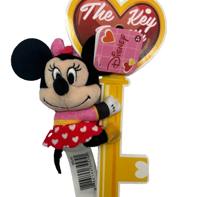 Disney Minnie Mouse mini plush in heart-print dress and bow attached to golden Key to My Heart backer card